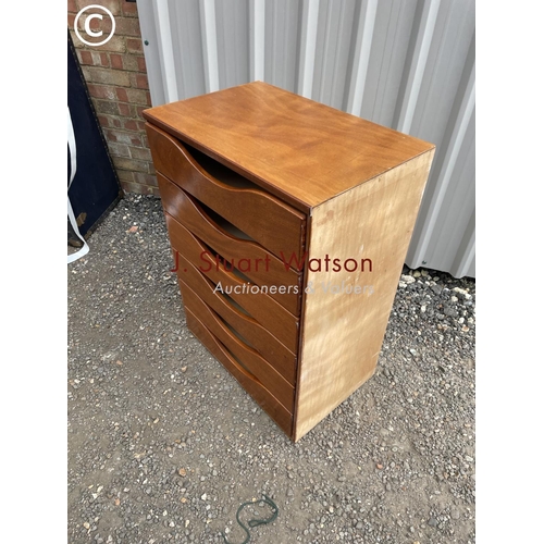 158 - A mid century ply chest of six drawers