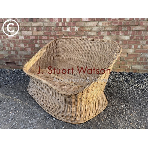 16 - A vintage wicker sofa