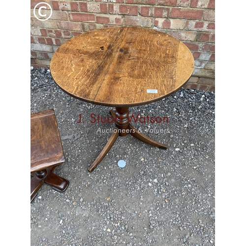 172 - An oak tripod table together with a small oak occasional table