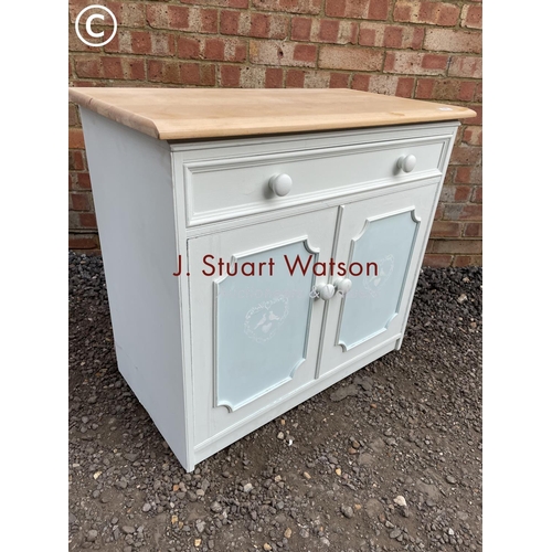 180 - A small painted pine sideboard