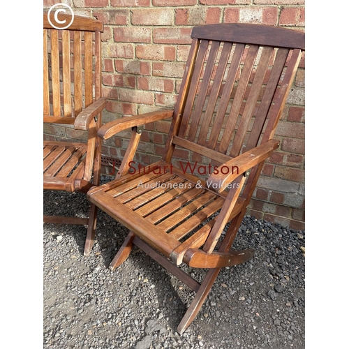 190 - A pair of hardwood garden folding chairs