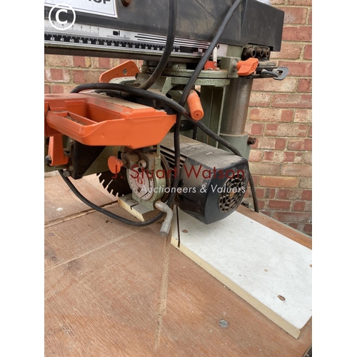 201 - A Dewalt radial arm powershop cross cut saw