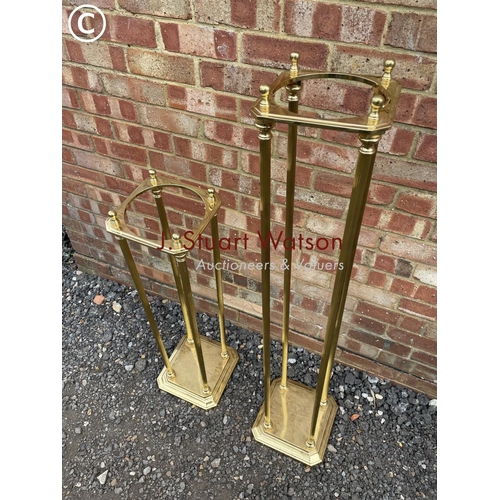 217 - A large and small brass hallstand - 125cm high