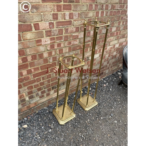 217 - A large and small brass hallstand - 125cm high