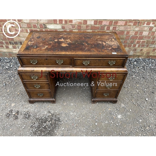 221 - A Queen Anne style walnut kneehole writing desk 112x60x77