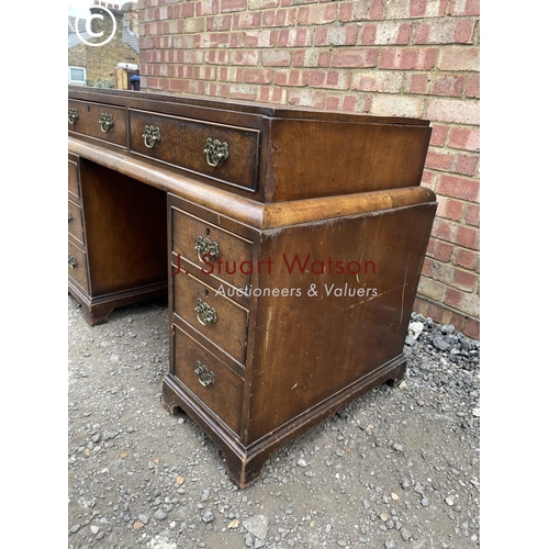 221 - A Queen Anne style walnut kneehole writing desk 112x60x77