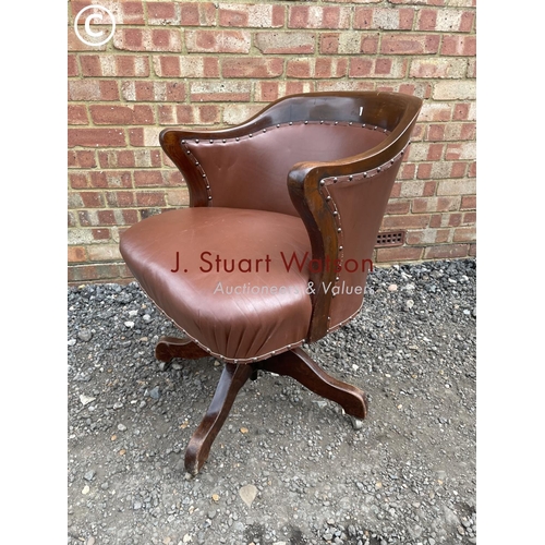 223 - A mahogany framed swivel office chair