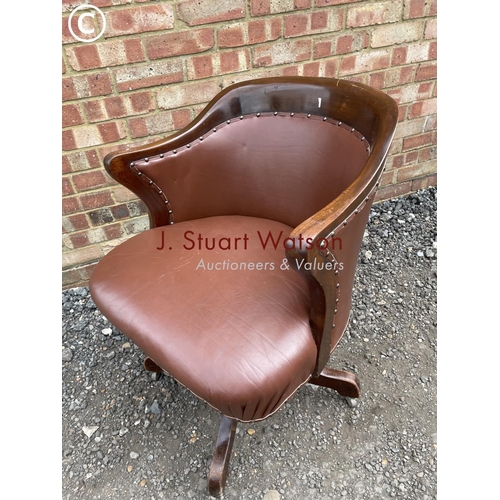 223 - A mahogany framed swivel office chair