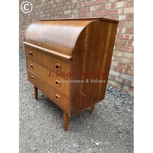 238 - A mid century teak danish style cylinder bureau with a fitted interior