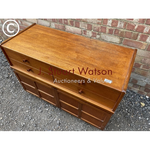 239 - A four drawer Nathan teak sideboard unit