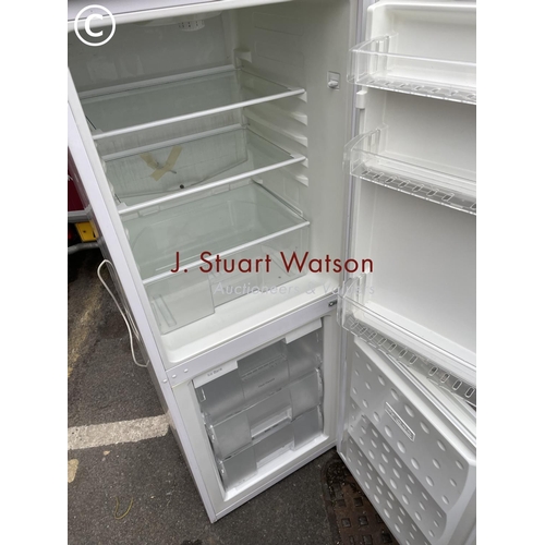 249 - A Beko upright fridge freezer