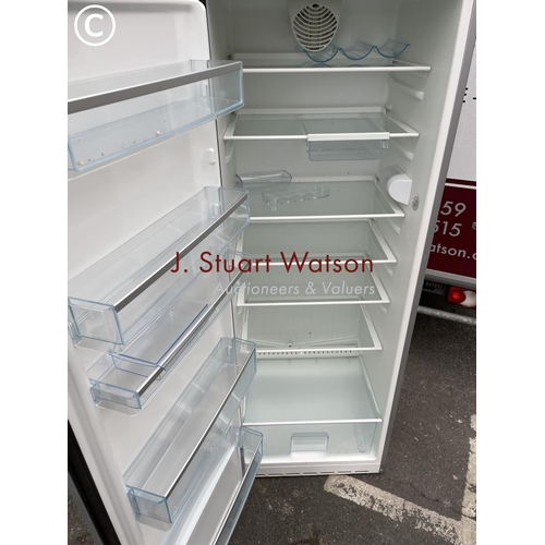 250 - A silver Bosch upright larger fridge