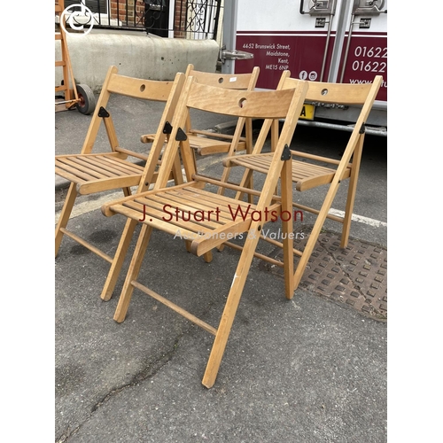 257 - Four wooden folding chairs