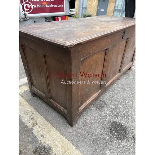 263 - An antique oak three panel coffer