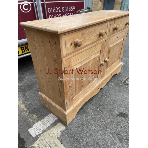 269 - A solid pine two drawer sideboard