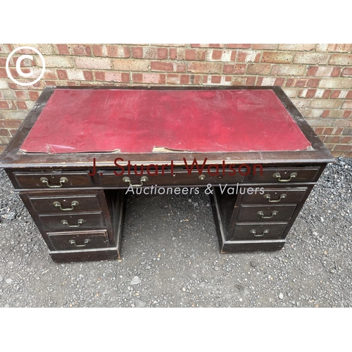 27 - A mahogany pedestal desk