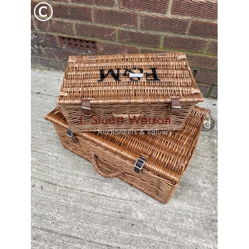 281 - Two Fortnum and Masons wicker baskets together with a shopping basket