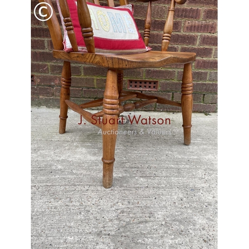 282 - A country farmhouse style Windsor carved chair, height to seat 45cm