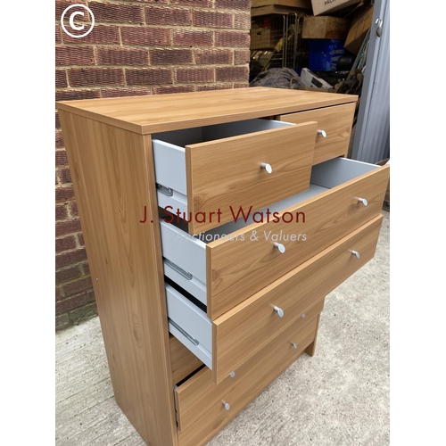 289 - A modern tallboy chest of 7 drawers