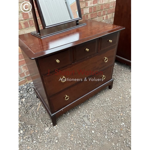 296 - A Stag chest of five drawers with swing mirror