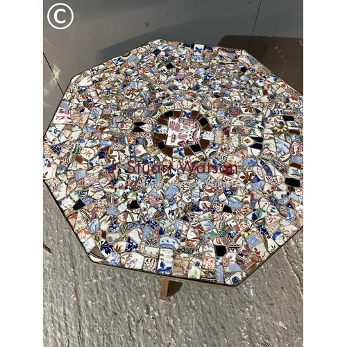 305 - An unsual mid century coffee table with a mosaic top