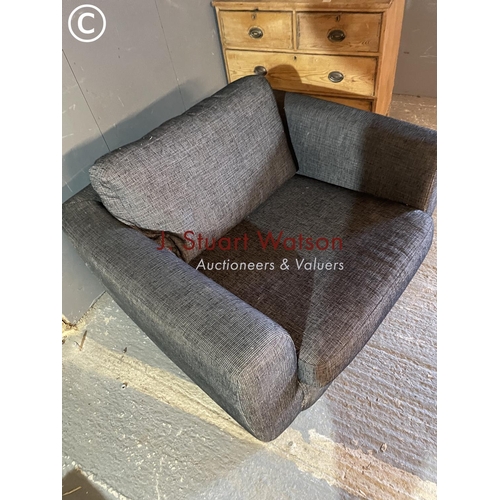 307 - A modern grey upholstered love seat armchair by John Lewis