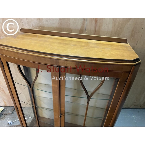 324 - A 1930's walnut display cabinet with four glass shelves