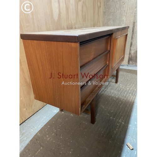 355 - A mid century teak sideboard 138 wide