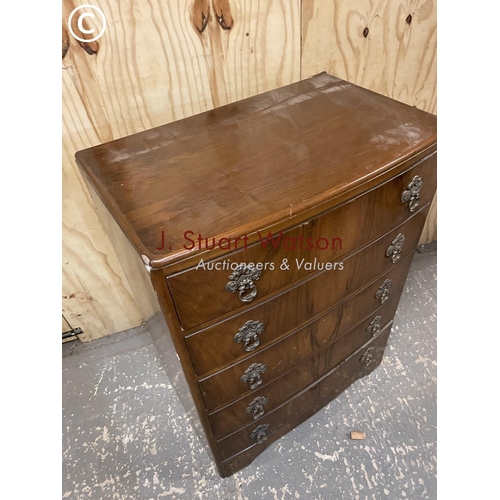 359 - A walnut veneered tallboy chest of five