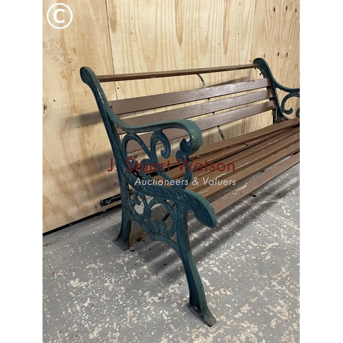 384 - An iron framed garden bench in need of refurbishment