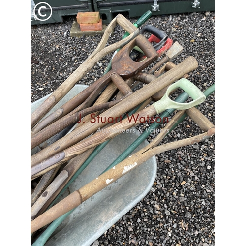 422 - Wheel barrow and assorted garden tools