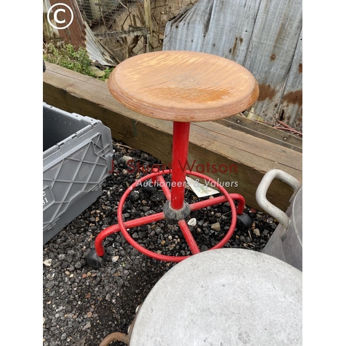 426 - Two large aluminium urns and a red swivel stool