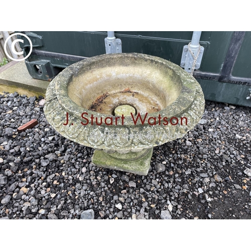 427 - A weathered single pedestal garden urn