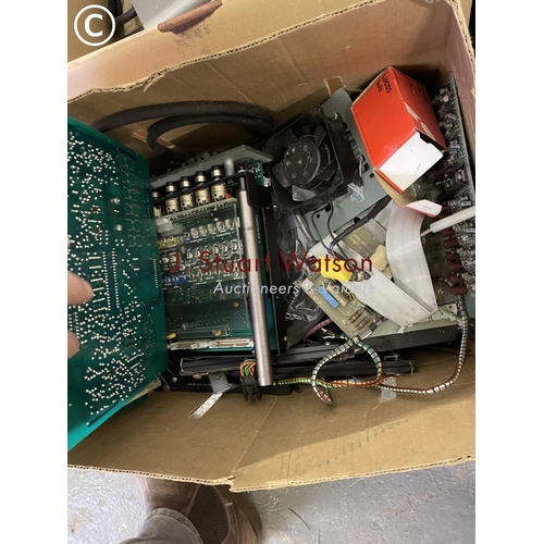 447 - Four boxes of assorted resisters, circuit boards and cables