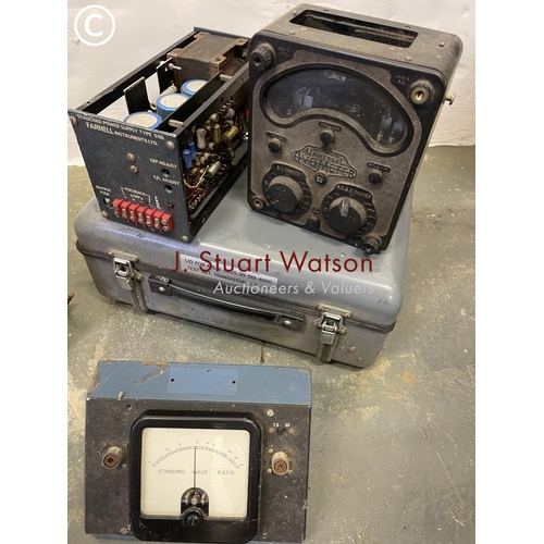 453 - A crate containing a universal volt meter together with four other radio segments