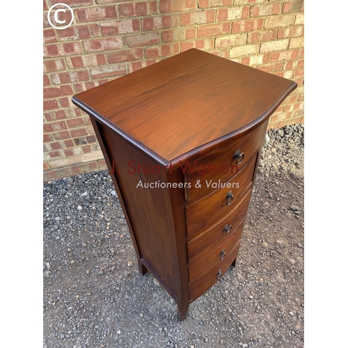 67 - A modern hardwood tallboy chest of five drawers