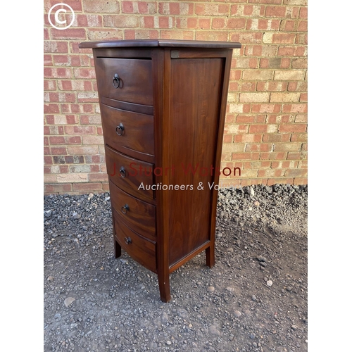 67 - A modern hardwood tallboy chest of five drawers