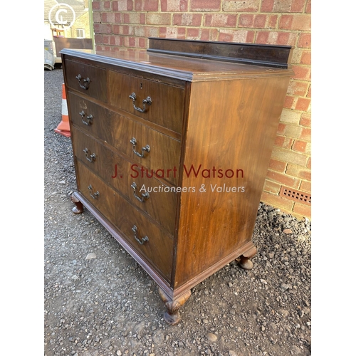 68 - A Queen Anne stye walnut chest of five drawers