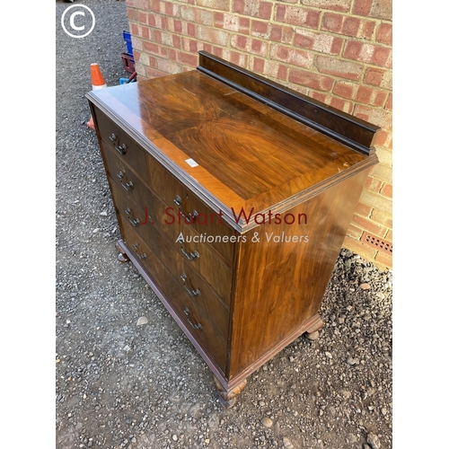 68 - A Queen Anne stye walnut chest of five drawers