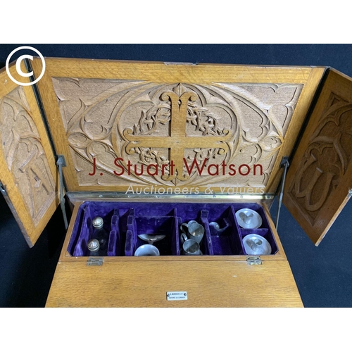 735 - Antique light oak travelling communion set, by A R Mowbray and Co. Size closed 45 x 15 x 28cms