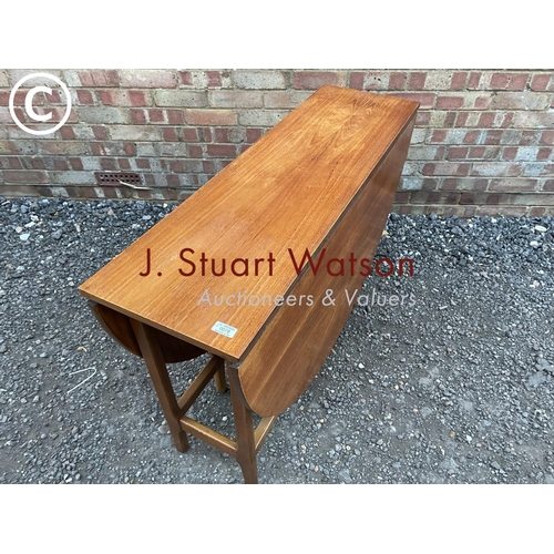 78 - A mid century teak drop leaf table