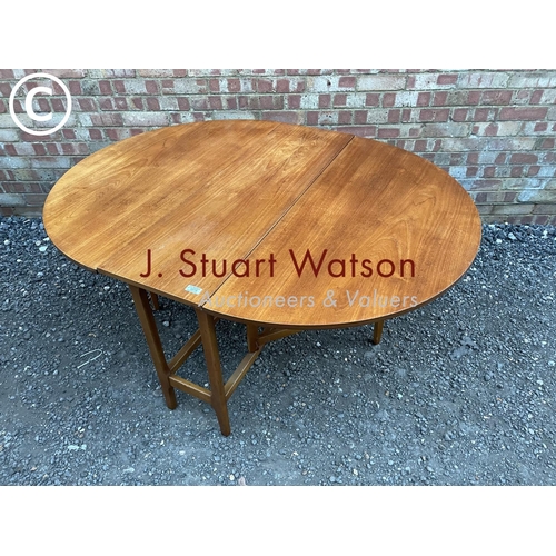 78 - A mid century teak drop leaf table