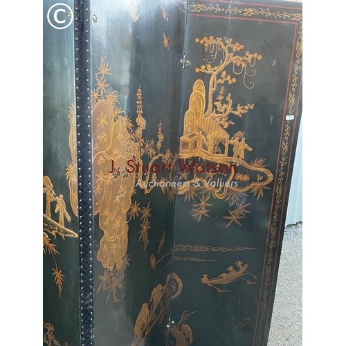 85 - A very large four section oriental folding screen decorated to both sides 220cm high