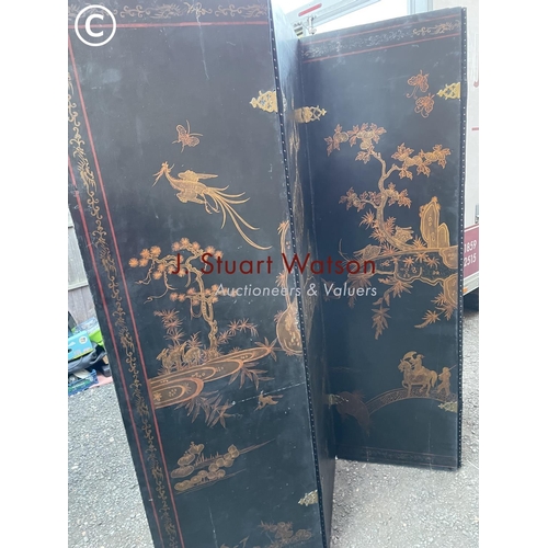 85 - A very large four section oriental folding screen decorated to both sides 220cm high