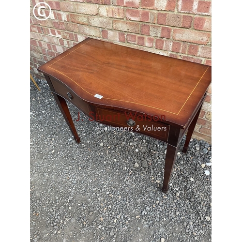 88 - A reproduction mahogany serp  front hall table