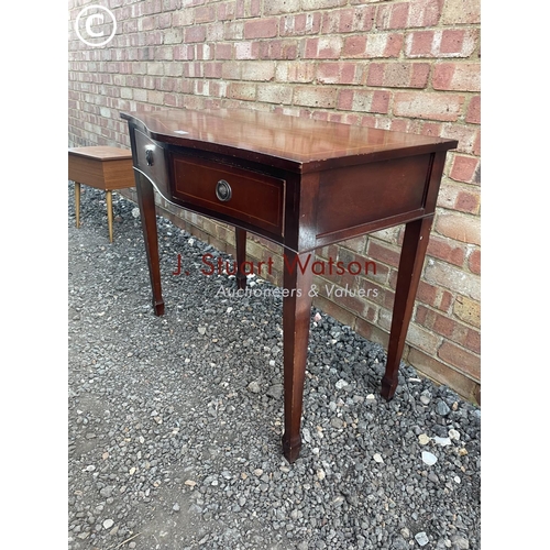 88 - A reproduction mahogany serp  front hall table