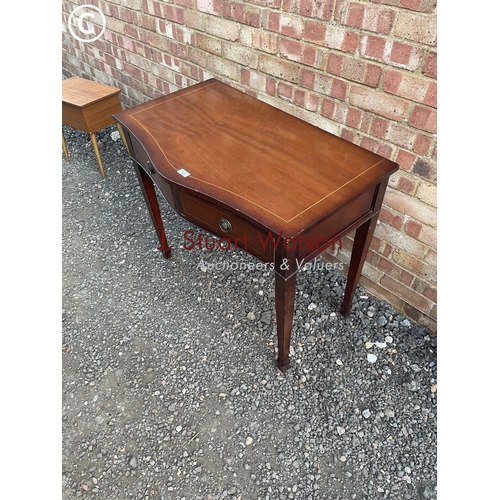 88 - A reproduction mahogany serp  front hall table