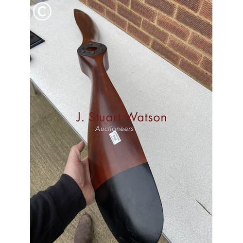 283 - A reproduction hardwood propeller 154cm long