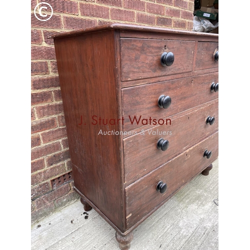 121 - An antique pine chest of five drawers