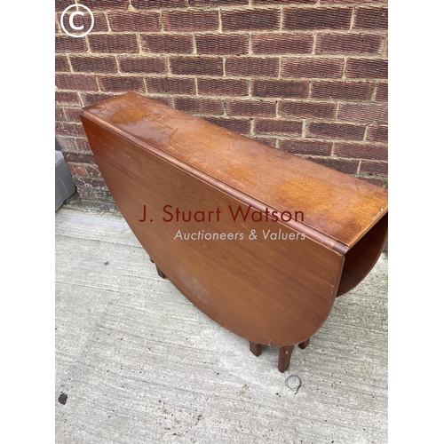 128 - A mid century teak gateleg table